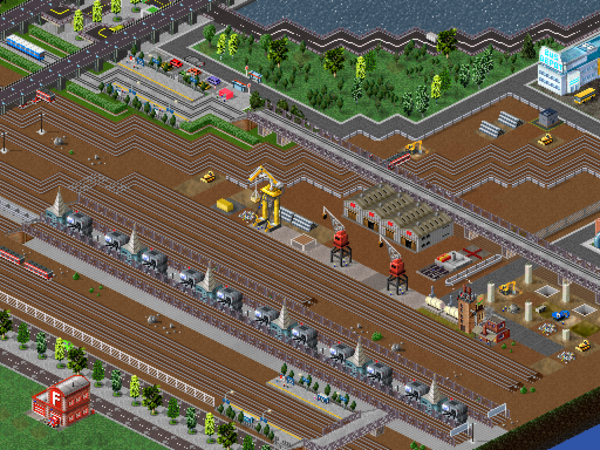 The inner- city railyard and warehouse. Owned by the ‘Metropolitan Rapid Transport : MRT’ <br />The elevated tracks are for high-speed inter-city bullet trains.